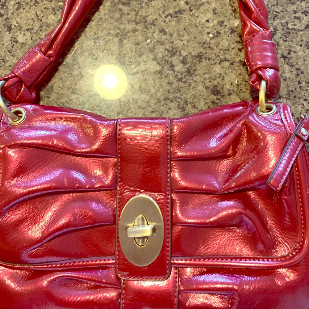 Bright red shiny purse